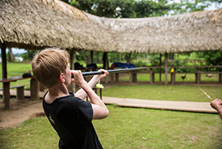 Blowing darts - Sani Lodge - Ecuador Resorts & Eco Lodges