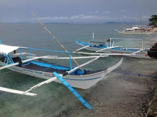 Banca Boats - Crystal Blue Resort - Philippines Dive Resort