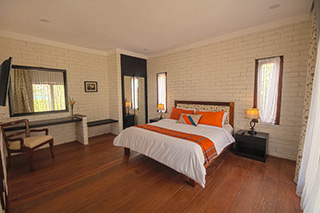 Cottage bedroom - Maluku Resort & Spa  - Indonesia Dive Resorts