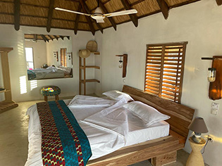 bedroom - water chalet - Ossimba Beach Lodge - Mozambique Dive Resort