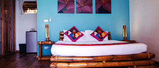 Bedroom - Deluxe cottage - Tepanee Beach Resort, Malapascua - Philippines Dive Resort