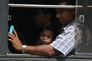 Riding a bus in Burma